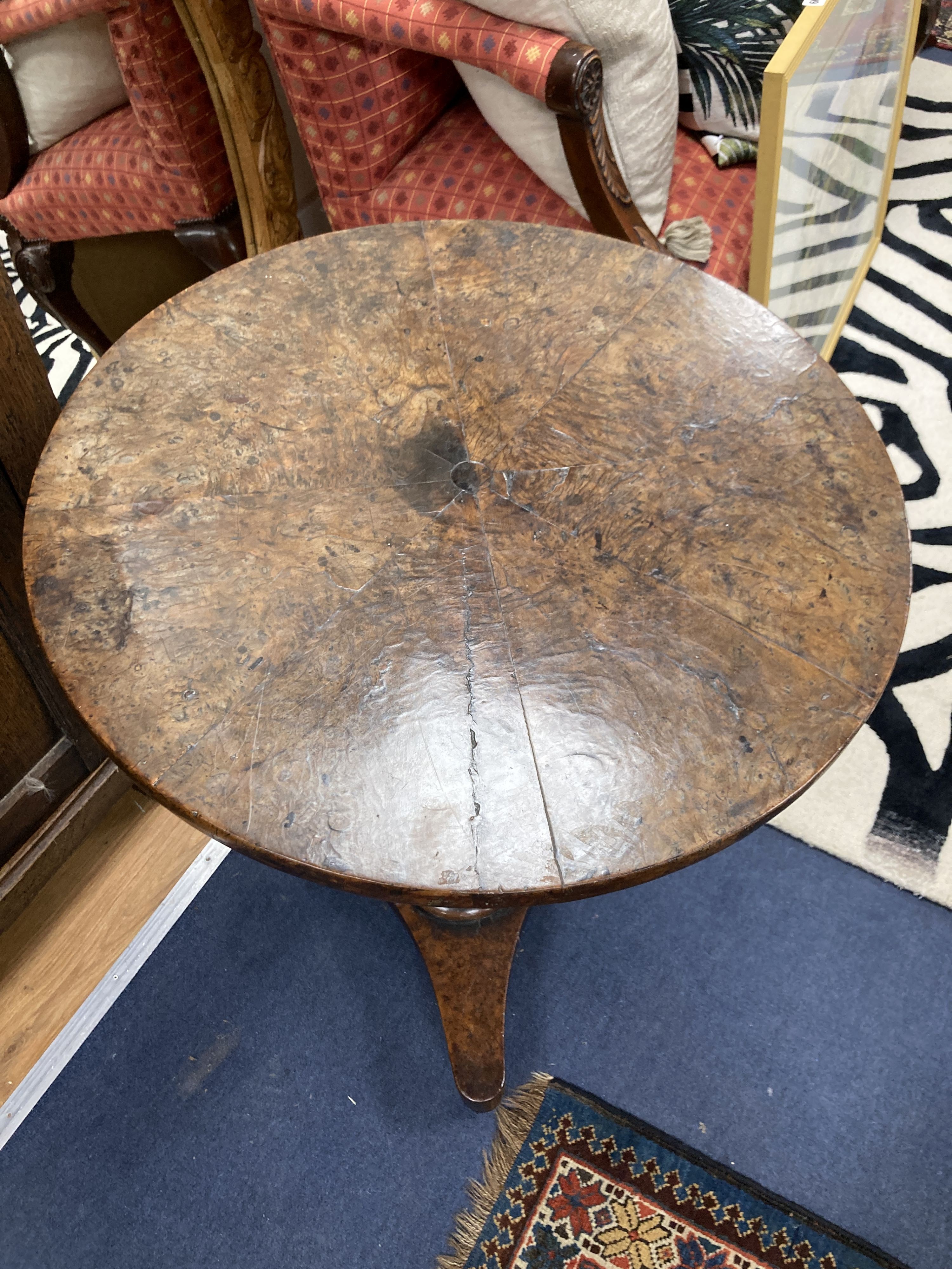 A George III yew and burr yew circular tea table. D-56, H-73cm.